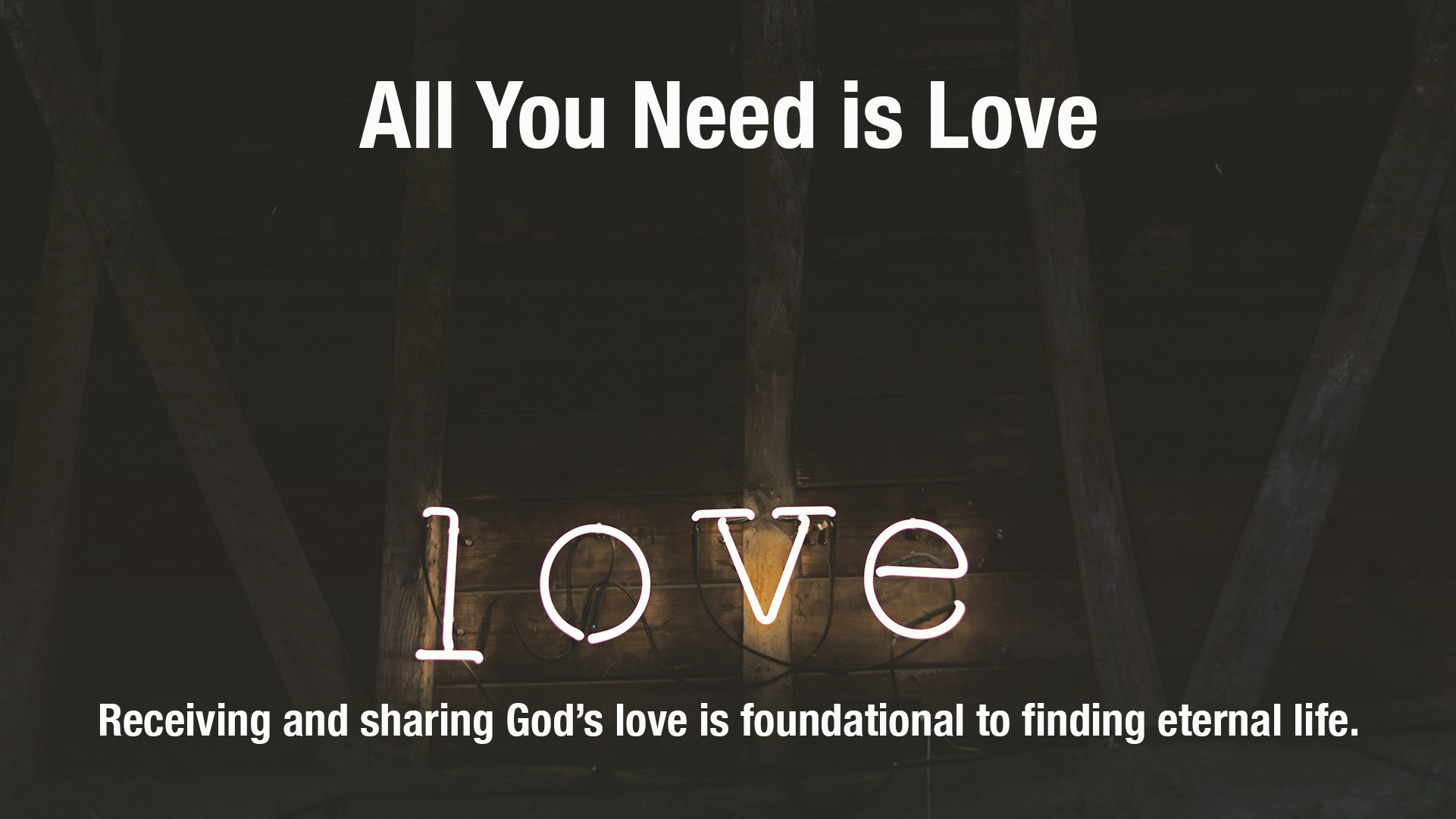 Title sheet with All you need is love with the word Love in neon lights.